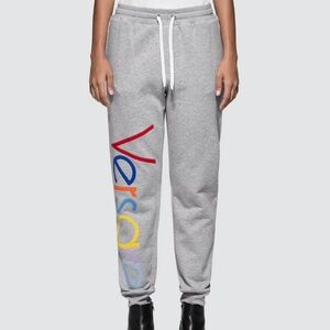 Grey Rainbow letter Versace sweatpants.